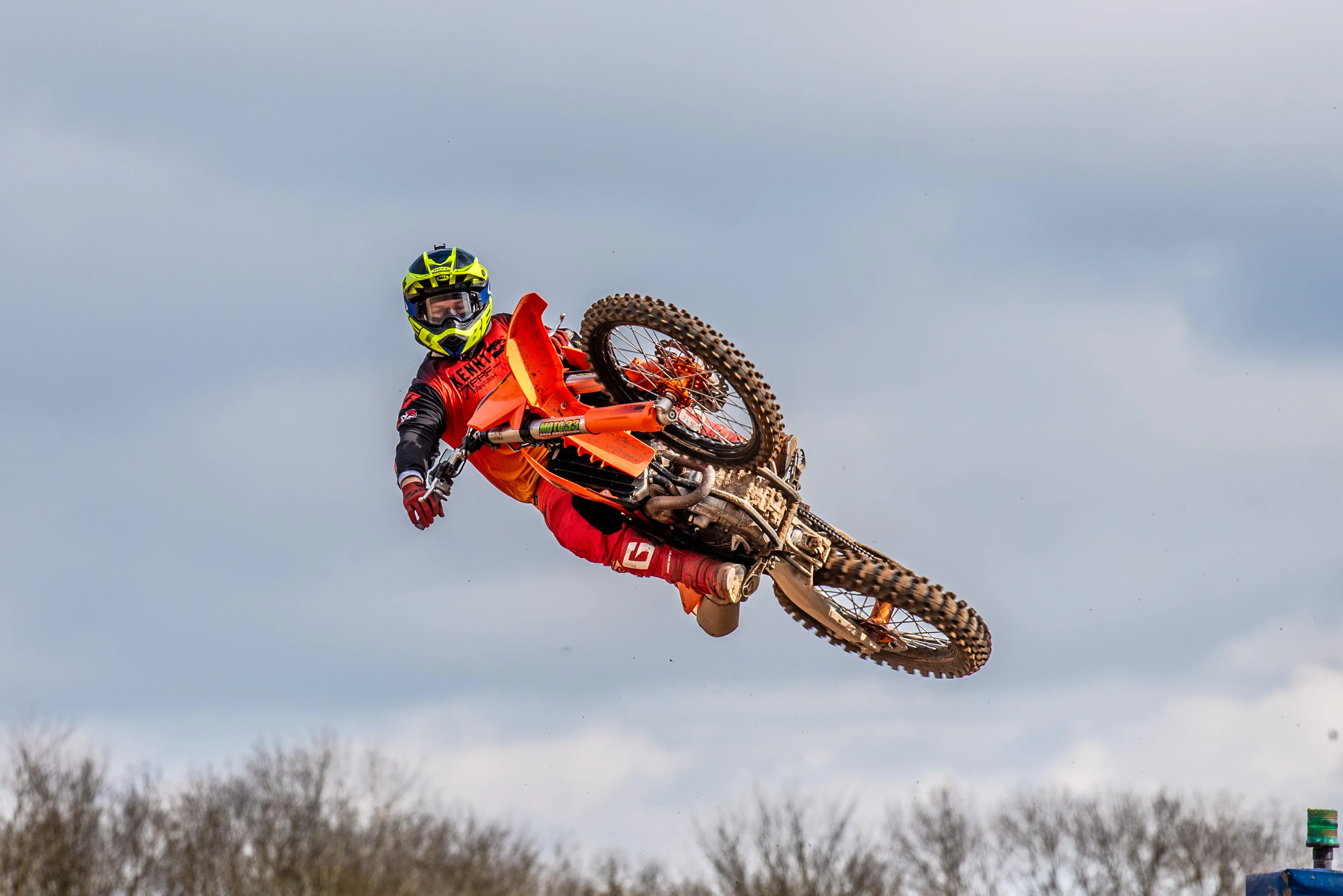 VIP membership rider performing aerial trick on motocross bike
